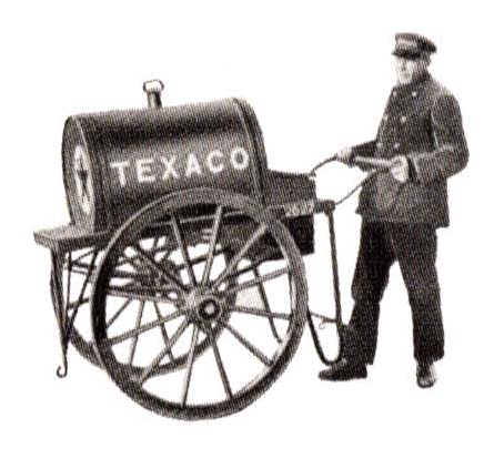 Man holding Texaco cart