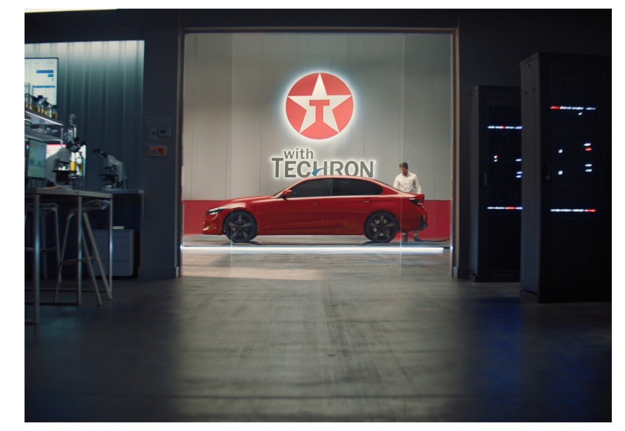 Red Car with Techron logo above